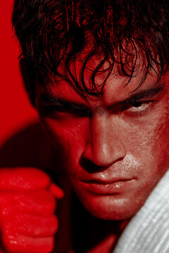 Intense Close Up of Sweaty Fighter with Red Lighting