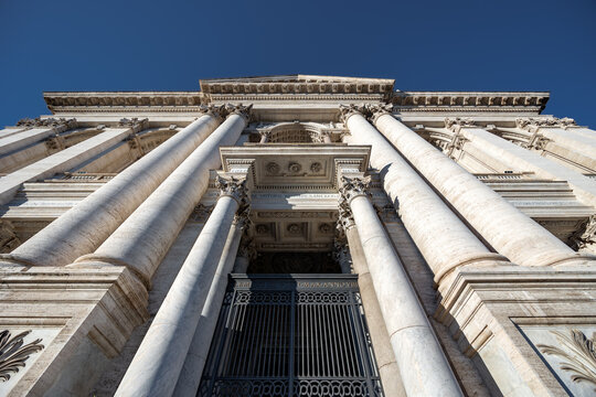 Facade of Basilica di San Giovanni in Laterano on sunny day close bottom up view, Rome, Italy