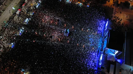 Aerial top view of crowd people at night music concert © Kokhanchikov