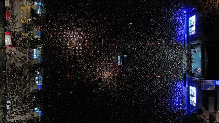 Aerial top view of crowd people at night music concert © Kokhanchikov