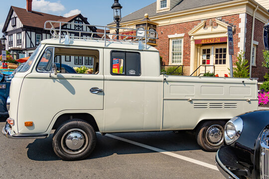 Andover, Massachusetts, US-July 14, 2024: Classic white VW microbus or van also known as a kombi at antique car show.