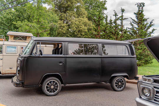 Andover, Massachusetts, US-July 14, 2024: Classic black VW microbus or van also known as a kombi at antique car show.
