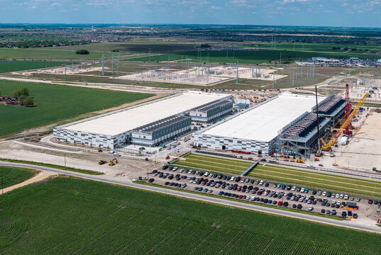 Aerial view of the construction of a massive AI data center campus with 400 million square feet hosting and 600MW capacity in Hutto Texas