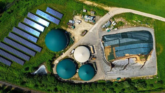 Aerial View of Solar Farm and Biogas Storage Domes in Germany