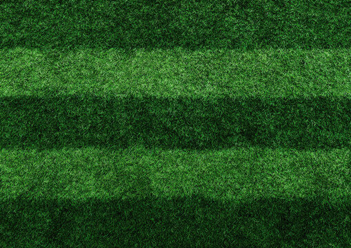 Texture of a green artificial grass surface with alternating light and dark stripes resembling a sports field or stadium pitch