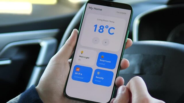 User checking the status of a smart home security system from a car. Smart lock locked and alarm armed. Ideal for home safety, remote monitoring, and IoT protection stock footage.