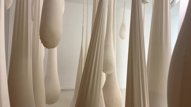 Art installation with white milk drops in cheese museum