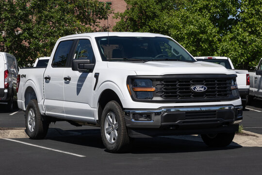 Ford F-150 4X4 Supercrew truck at a dealership. Ford offers the F150 with a 5.0L V8 gas engine. MY:2026