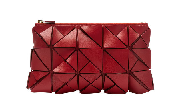 Isolated luxury red leather clutch bag with modern geometric faceted design and gold zipper