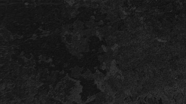 Halftone texture dark distressed grunge retro film noise grainy surface ideal for vintage graphic design and cinematic overlay effects.