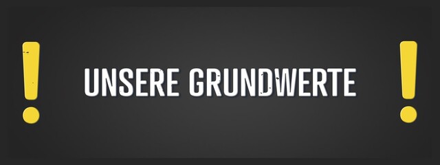 Unsere Grundwerte (Our core values) - A blackboard illustration with white text. © lhphotos