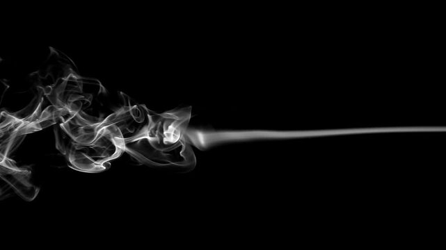 Stream of wispy smoke over a black background. Vertically Orientated Video.