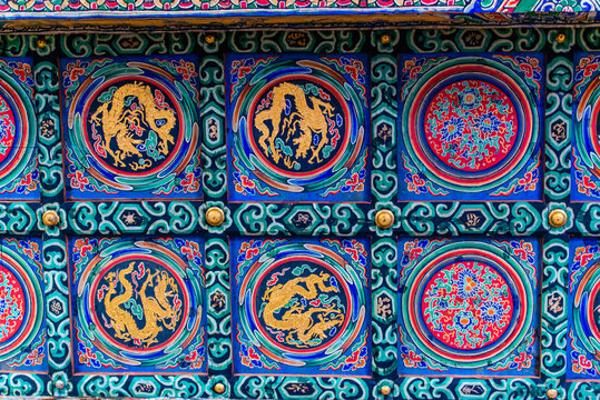 Datong, China - May 9 2026: Brilliantly colored glazed roof of Huayan Temple showcasing intricate polychrome tiles, elaborate eaves, and refined Liao-era architectural craftsmanship