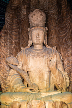 Datong, China - May 9 2026: Ancient Buddhist sculpture in Huayan Temple, expressing spiritual serenity, exquisite craftsmanship, and the legacy of Chinese Buddhist art