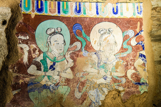 Datong, China - May 9 2026: Vivid Buddhist mural paintings in Huayan Temple showcasing intricate iconography, flowing lines, and rich colors reflecting Liao and Jin dynasty religious artistry