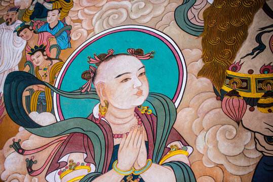 Datong, China - May 9 2026: Vivid Buddhist mural paintings in Huayan Temple showcasing intricate iconography, flowing lines, and rich colors reflecting Liao and Jin dynasty religious artistry