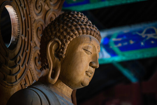 Datong, China - May 9 2026: Ancient Buddhist sculpture in Huayan Temple, expressing spiritual serenity, exquisite craftsmanship, and the legacy of Chinese Buddhist art