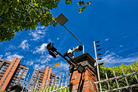 Electrical protection fence and surveillance camera of a private property in the city of Medellin, Colombia.