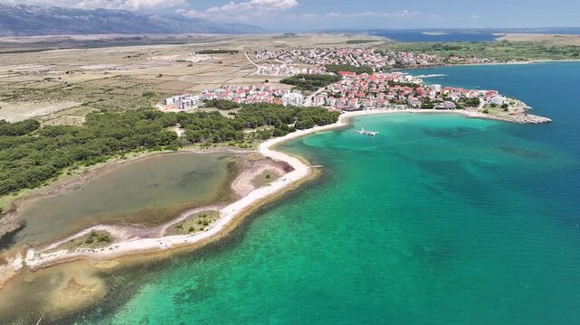 Aerial view of medicinal mud lagoon with panoramic views of Povljana village and surrounding coastline