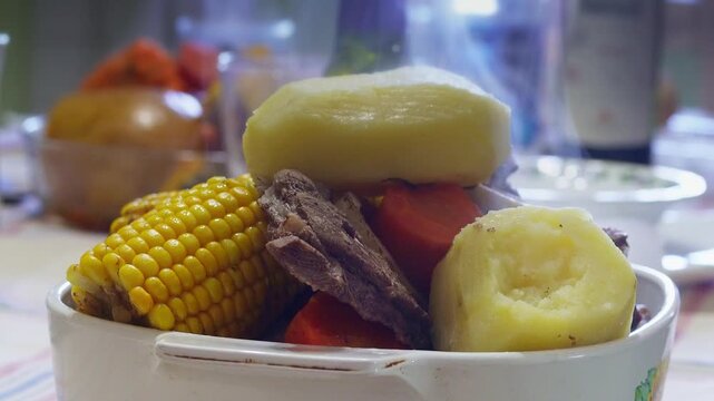 Traditional argentine puchero stew with beef and vegetables, 4K vertical