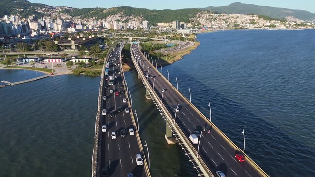 Aerial View of Pedro Ivo Campos and Colombo Salles Bridges with City Traffic and Ocean Coastline in Florianopolis Santa Catarina Brazil