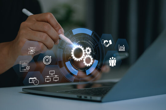 Businessman developing digital automation system and AI workflow optimization, Concept of process management, operational efficiency, automation business technology, digital transformation strategy.