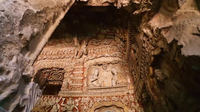 Yungang, China - May 9 2026: Intricately carved colorful ornaments in the Yungang Grottoes, showcasing exquisite craftsmanship, vibrant artistry