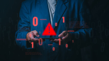 A professional man holds a smartphone displaying a red glowing warning triangle and binary code. This represents a cyber attack, security breach, and system error alert. © 418 House