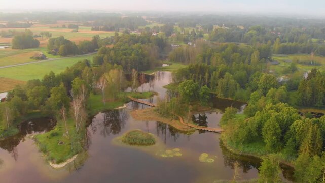 Drone footage captures a scenic aerial view of the unique Kirkilai Lakes in the Biržai Regional Park, Lithuania.