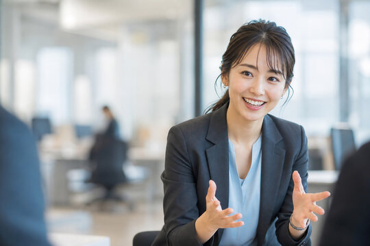 オフィスで談笑する女性社員 Generative AI