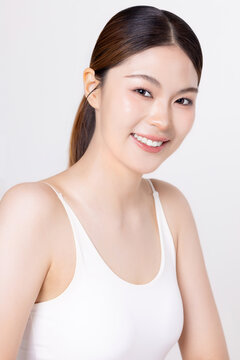 Beautiful Asian woman with clean fresh skin and natural makeup, beauty and skincare concept for commercial advertising and content, isolated on white background.