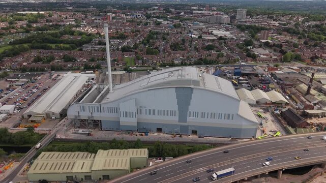 Aerial drone view of the Enfinium Kelvin Energy Recovery Facility beside the M5 motorway in Oldbury, West Midlands, England. Modern waste-to-energy infrastructure surrounded by industrial estates