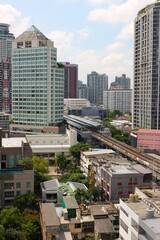 Naklejka premium High-rise condominiums and urban cityscape around BTS Phra Khanong in Bangkok, Thailand