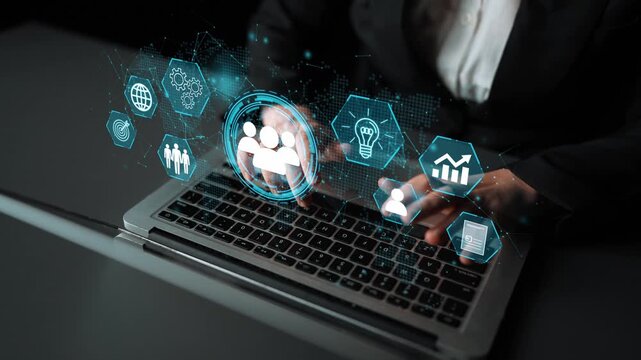 Professional Business Person Engaging with Virtual Interface on Laptop for Network and Technology Data Management in Modern Workspace. Entropy.