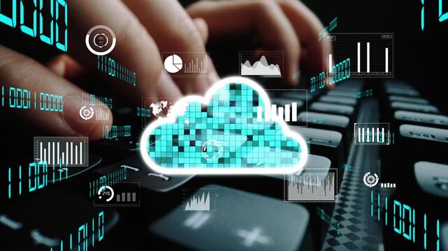 Close-up of hands typing on a keyboard with cloud computing graphics and data analytics charts, illustrating modern technology and digital business concepts in action. Xenic