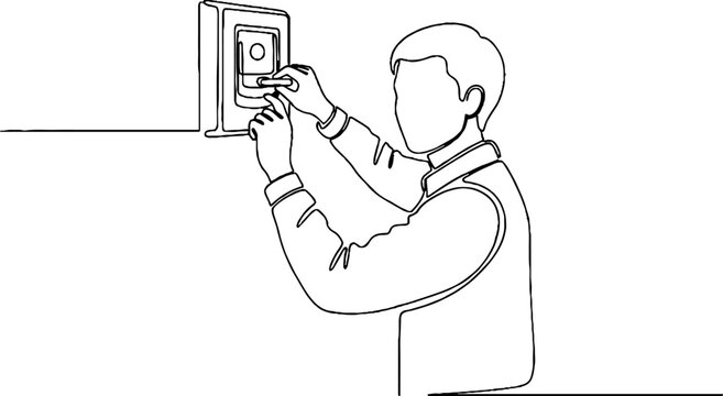 Man installing electrical outlet on wall.