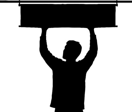 Silhouette of person lifting heavy object above head.