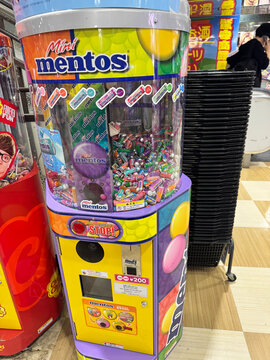 Hiroshima, Japan - April 20, 2026: Mentos vending machine inside of a Don Quijote store