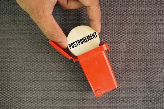 Trash can throw or remove the word postponement. officially pushing back a commitment, deadline, or appointment so it happens later than originally planned