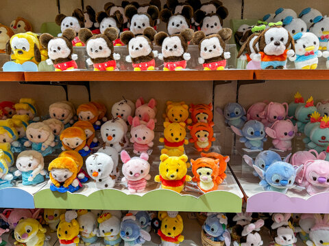 Tokyo, Japan - April 14, 2026: Assortment of kawaii-style plush Disney character toys sold at the Disney store