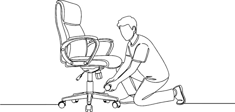 Man kneeling to adjust office chair wheels.