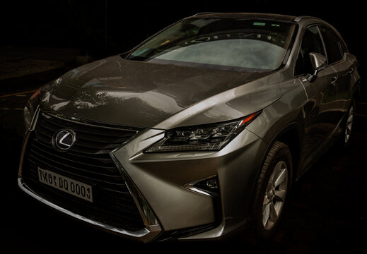Lexus RX metallic gray hybrid model car. Lexus is the luxury vehicle division of the Japanese automaker Toyota Motor Corporation, headquartered in Shimoyama, Aichi, Japan since 2024. 