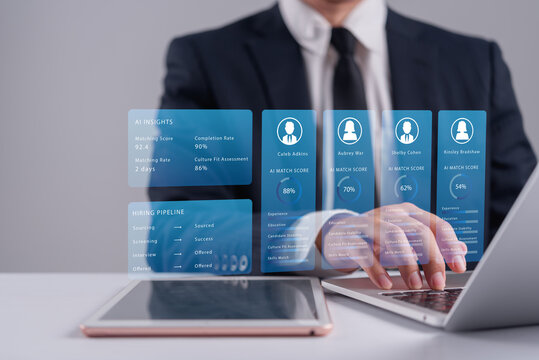 HR manager using laptop with AI candidate matching score graphic for recruitment process human resources technology talent acquisition and applicant tracking system software