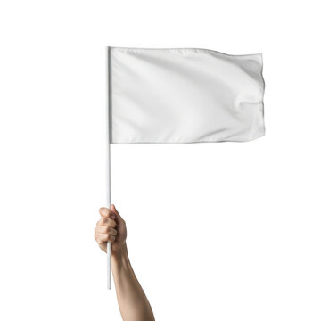Human hand holding a small white flag waving in the air
