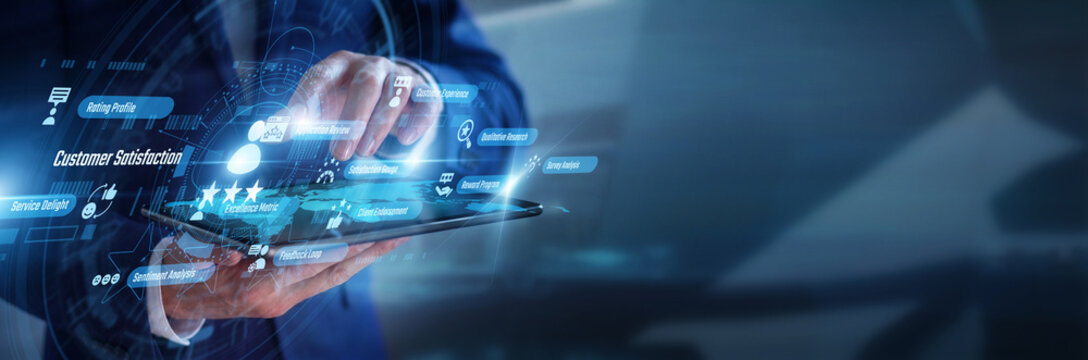 Service manager working on tablet analyzing digital Customer Satisfaction metrics. Professional reviewing client feedback data and positive experience graphs on a futuristic hologram screen.