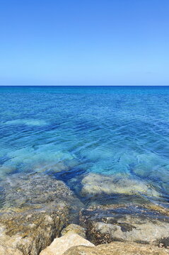 View of the open sea from a rocky shore