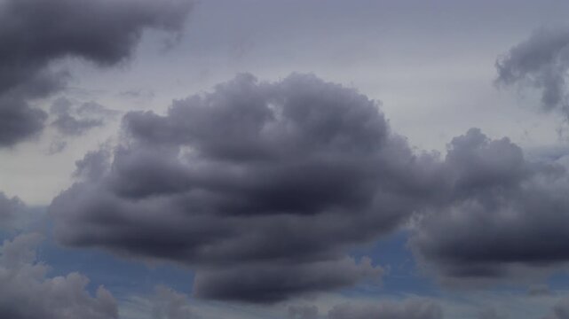 Atmospheric timelapse capturing the transition from fair weather to rain.