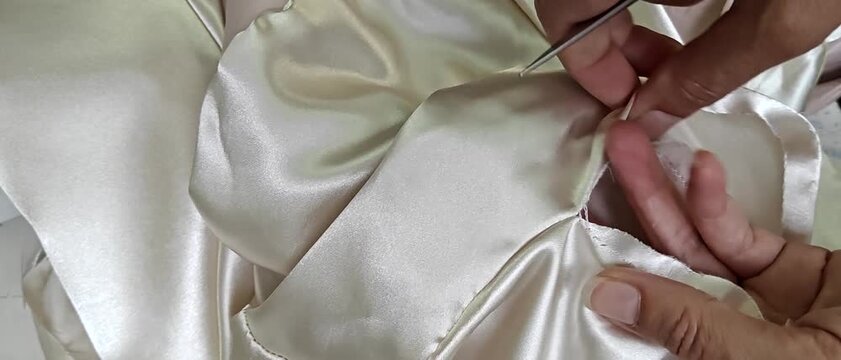 Seam Ripping and Fabric Alteration Process