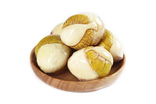 Golden Preserved Eggs in Wooden Bowl - Traditional Asian Century Eggs Ready to Eat Delicacy