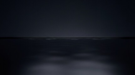Fototapeta premium Calm Dark Water Surface with Subtle Reflections